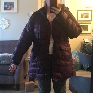 Plum coloured winter jacket.